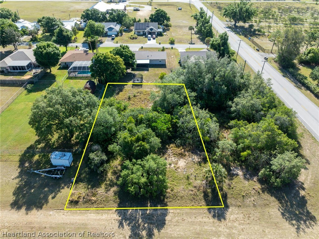 711 S YOUNG AVE, AVON PARK, FL 33825, photo 1 of 18